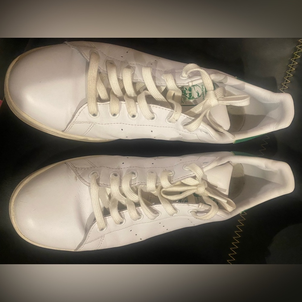 White Adidas size 11 1/2. Fair condition.